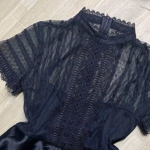 Elegant Black Lace Top and Satin Shorts Romper - Picture 2 of 3